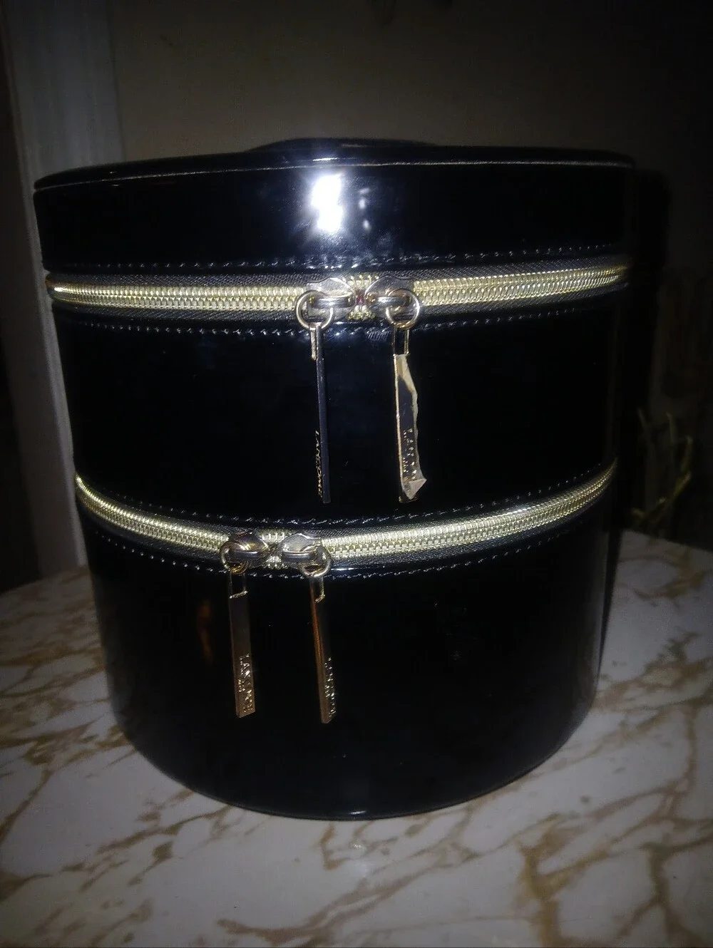 Black faux patent leather Lancôme Cosmetic Bag.